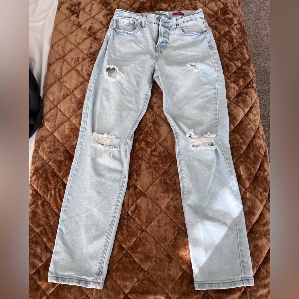 Celebrity Pink Iconic distressed faded blue jeans